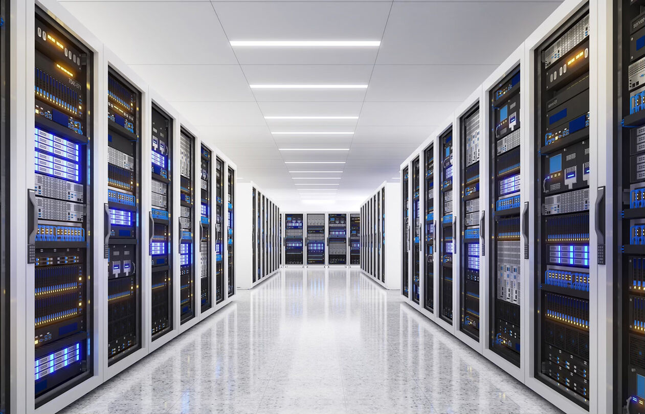 A modern data center corridor lined with server racks, featuring blue LED lights and a polished floor.