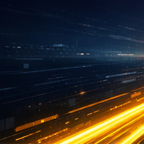 Abstract digital background with streaks of light in yellow and blue tones, creating a sense of motion and depth.