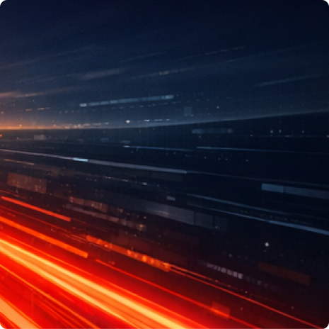 Abstract image featuring streaks of light in red and orange against a dark background, suggesting motion and speed.
